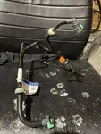 Genuine Ford Hose Assembly GG9Z-9D289-F. Fixed Price $136.00.