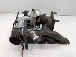 2006-2007 Volkswagen Passat 2.0L Exhaust Manifold With Turbocharger. Fixed Price $224.99.
